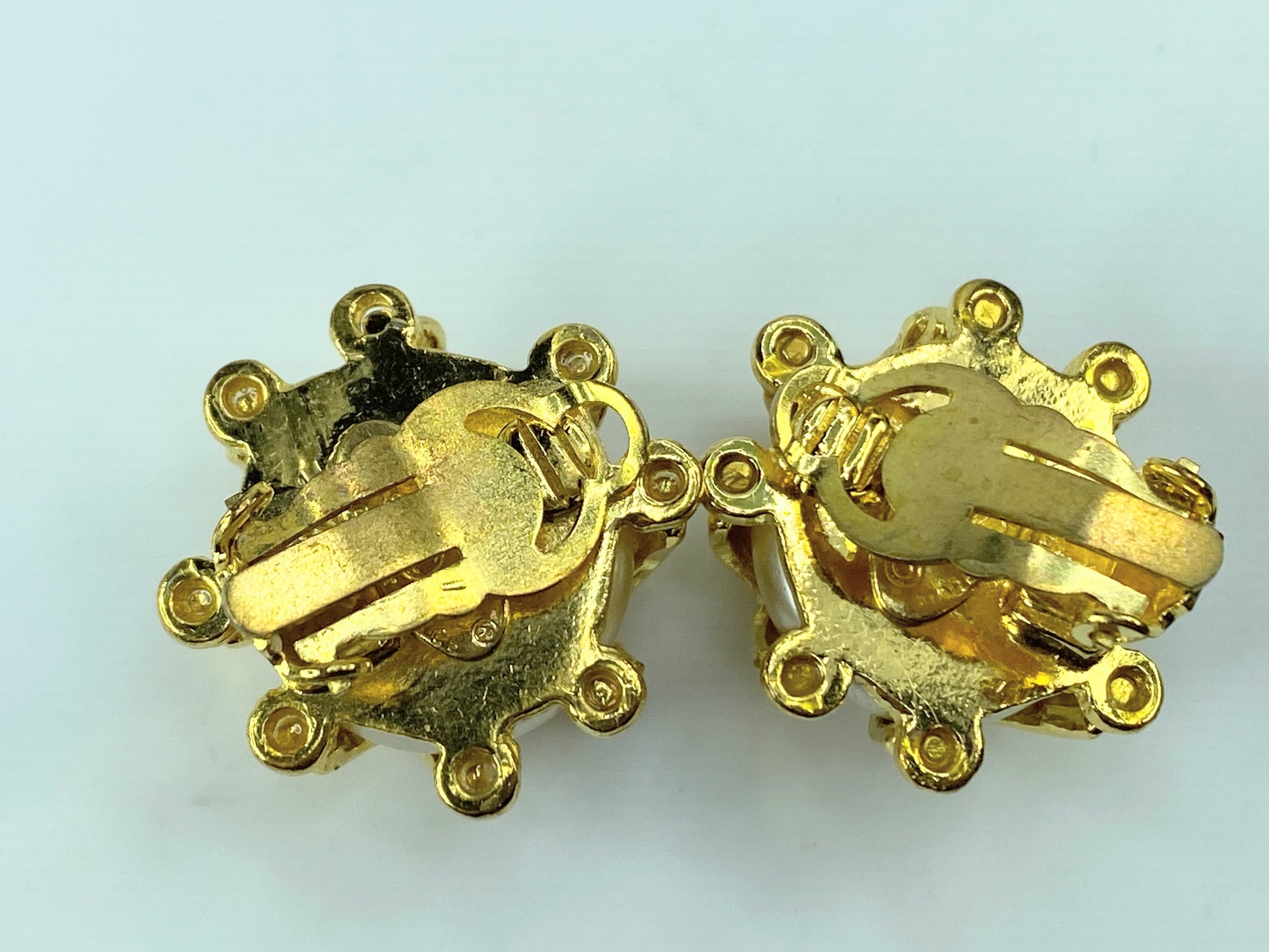 Iconic Chanel clip-on earrings pearl quilted with gold ribbons signed 93 P GS473