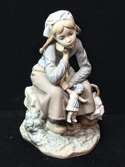 Vintage Lladró Daydreaming Girl with Doll and Basket Porcelain Figurine A1152