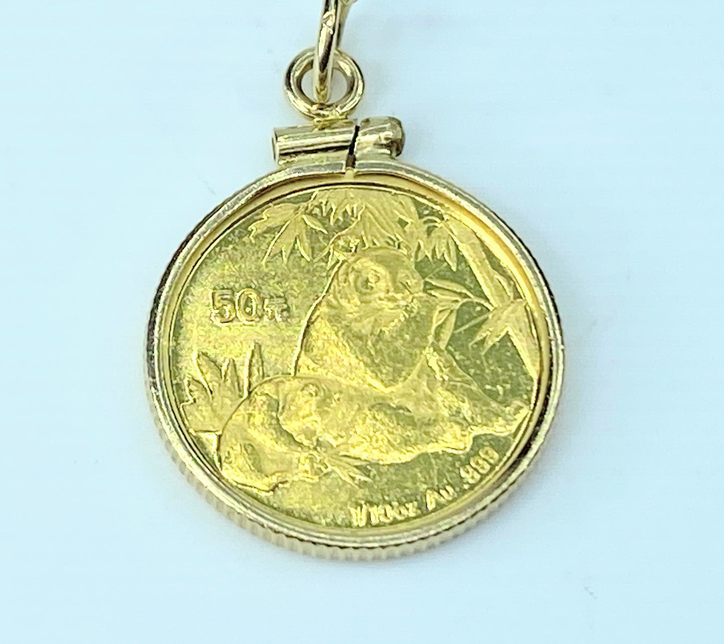 2007's 50 yuen 1/10oz Panda gold coin in 14K bezel 4.0g JR9517