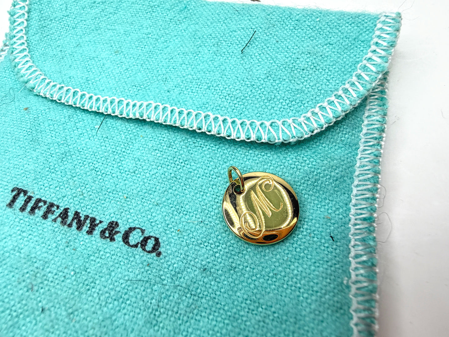 Vintage Tiffany & Co. Notes 18K Gold Letter M Disc Charm Pendant JR1951