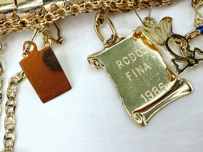 Vintage 14K Gold Charm Bracelet 8 Charms Playboy Diploma 7.25" JR1953