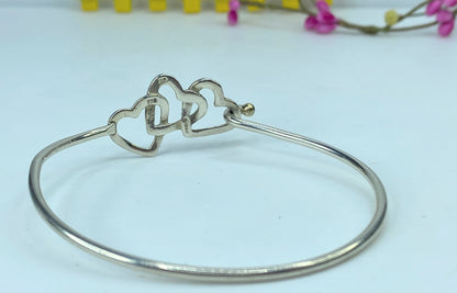 Tiffany & Co. 18k sterling silver Triple Heart eye hook bangle 7.0" JR708
