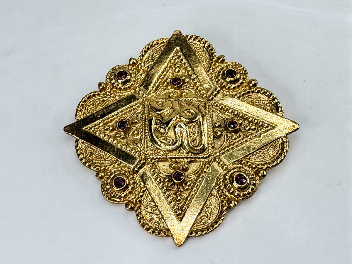 Vintage 1992 Butler & Wilson Gold Tone Hindu Om Brooch Purple Crystals GS852