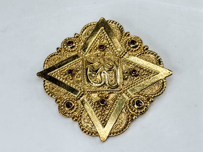 Vintage 1992 Butler & Wilson Gold Tone Hindu Om Brooch Purple Crystals GS852