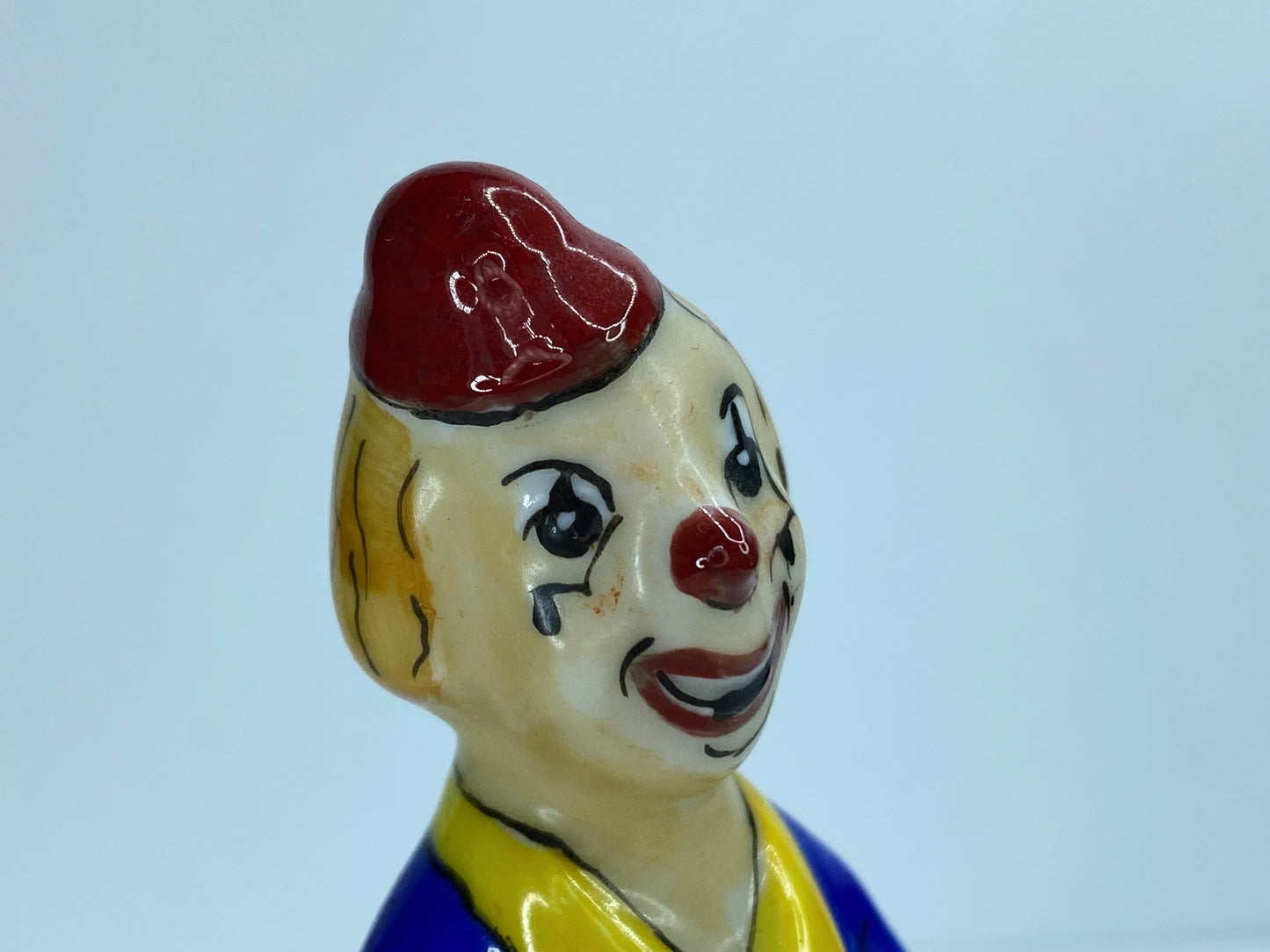 Limoges JD Jester clown holding Flower and Flute trinket A55