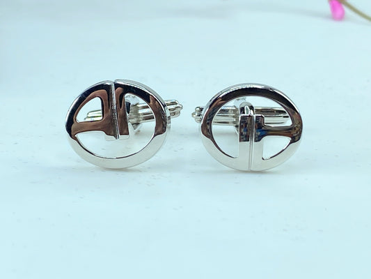 DUNHILL silver tone Logo D cufflinks set in black velvet box GS346