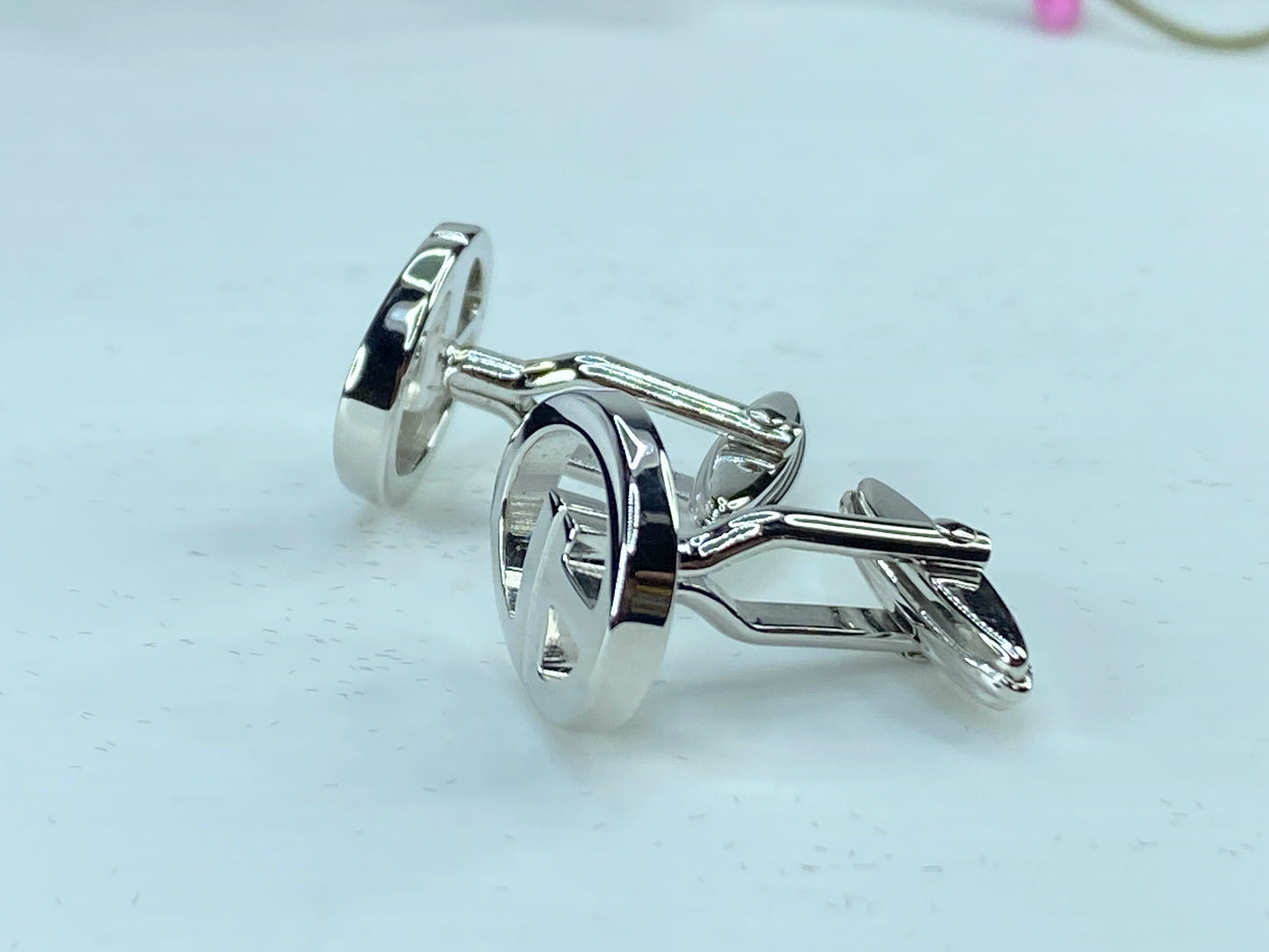 DUNHILL silver tone Logo D cufflinks set in black velvet box GS346
