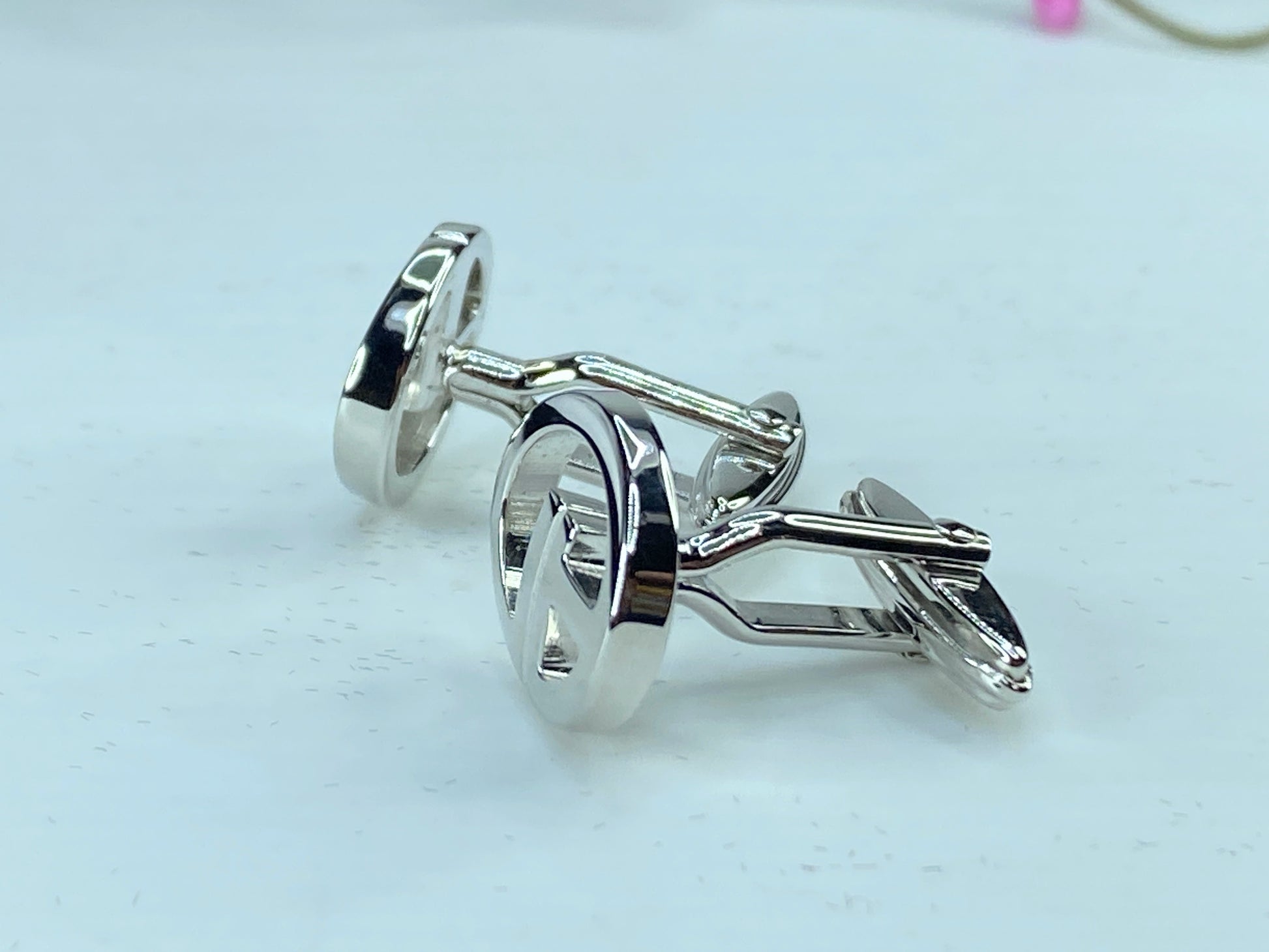 DUNHILL silver tone Logo D cufflinks set in black velvet box GS346