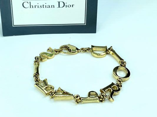Christian Dior Bracelet Gold Auth Golden Letters bracelet 7 .75" 14.6g GS568