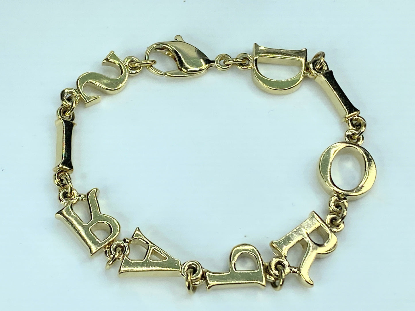 Christian Dior Bracelet Gold Auth Golden Letters bracelet 7 .75" 14.6g GS568