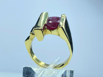 Contemporary 2.25ct Oval Ruby 0.24ct round brilliant diamond in 18K ring