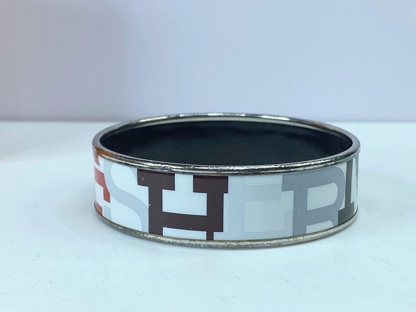 Hermes Bracelet Hermes wide 'Capitales' printed 18mm enamel bangle 7" GS583