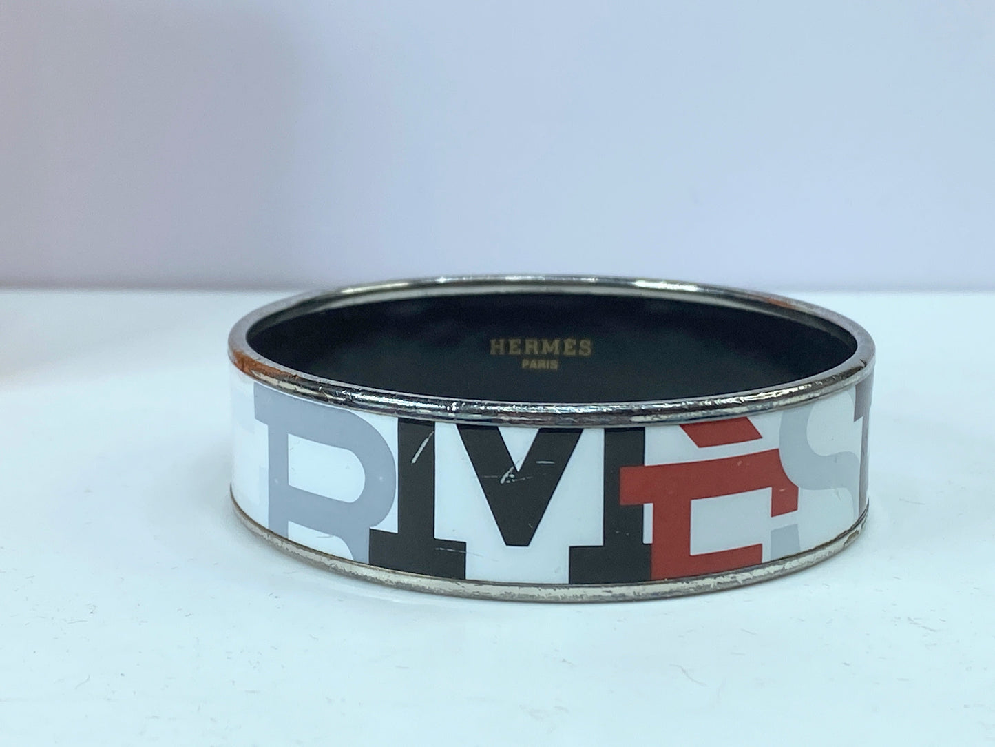 Hermes Bracelet Hermes wide 'Capitales' printed 18mm enamel bangle 7" GS583