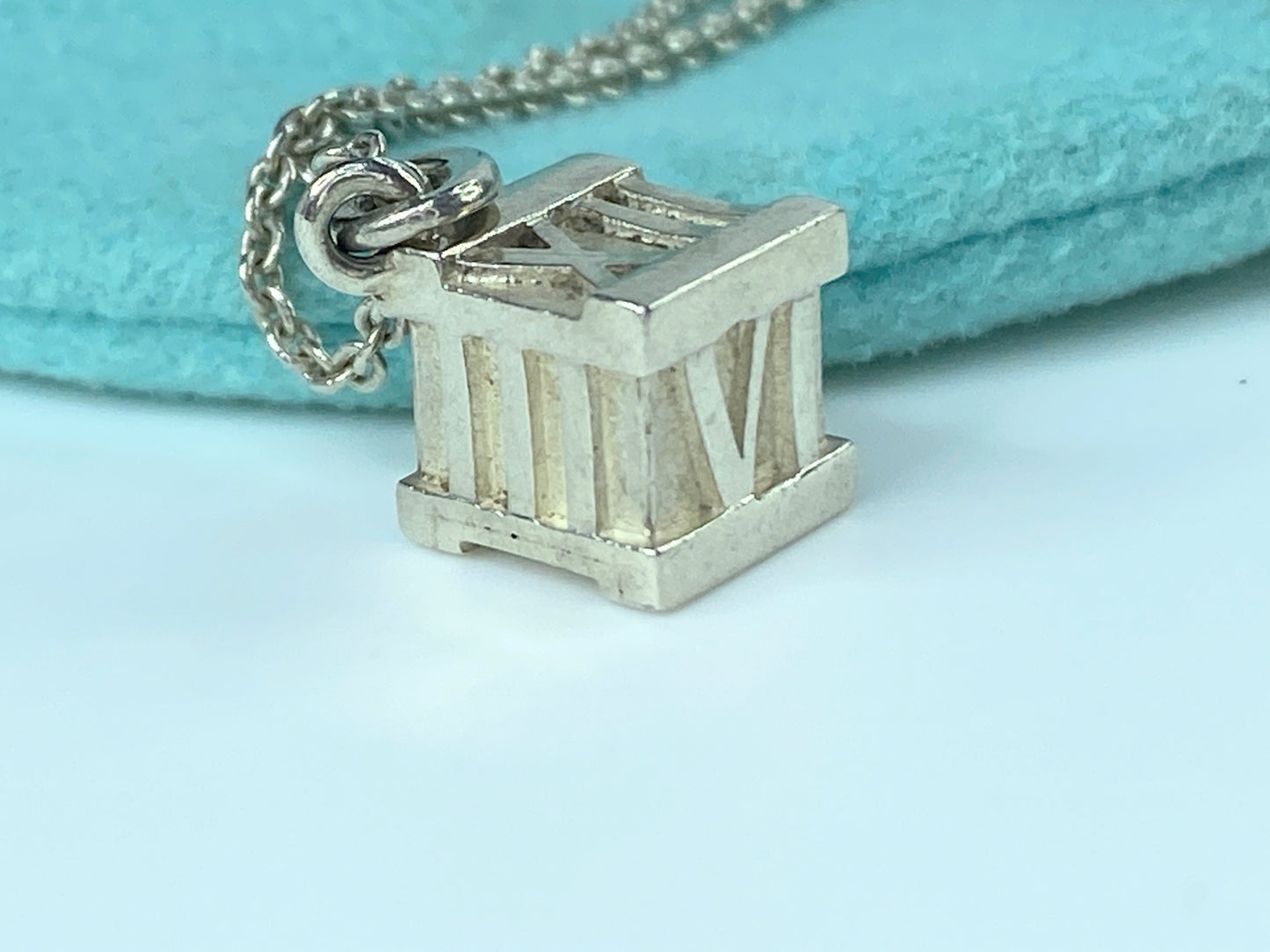 Tiffany & Co Atlas Silver Roman Numerals Square Cube Pendant Necklace JR9723