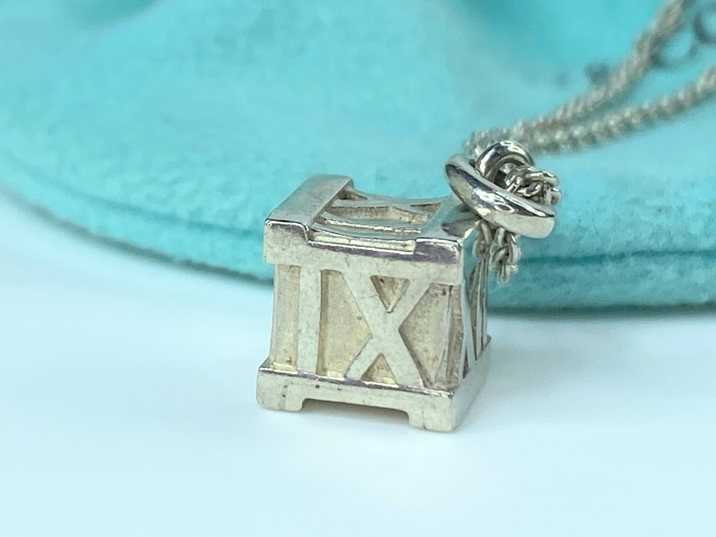 Tiffany & Co Atlas Silver Roman Numerals Square Cube Pendant Necklace JR9723