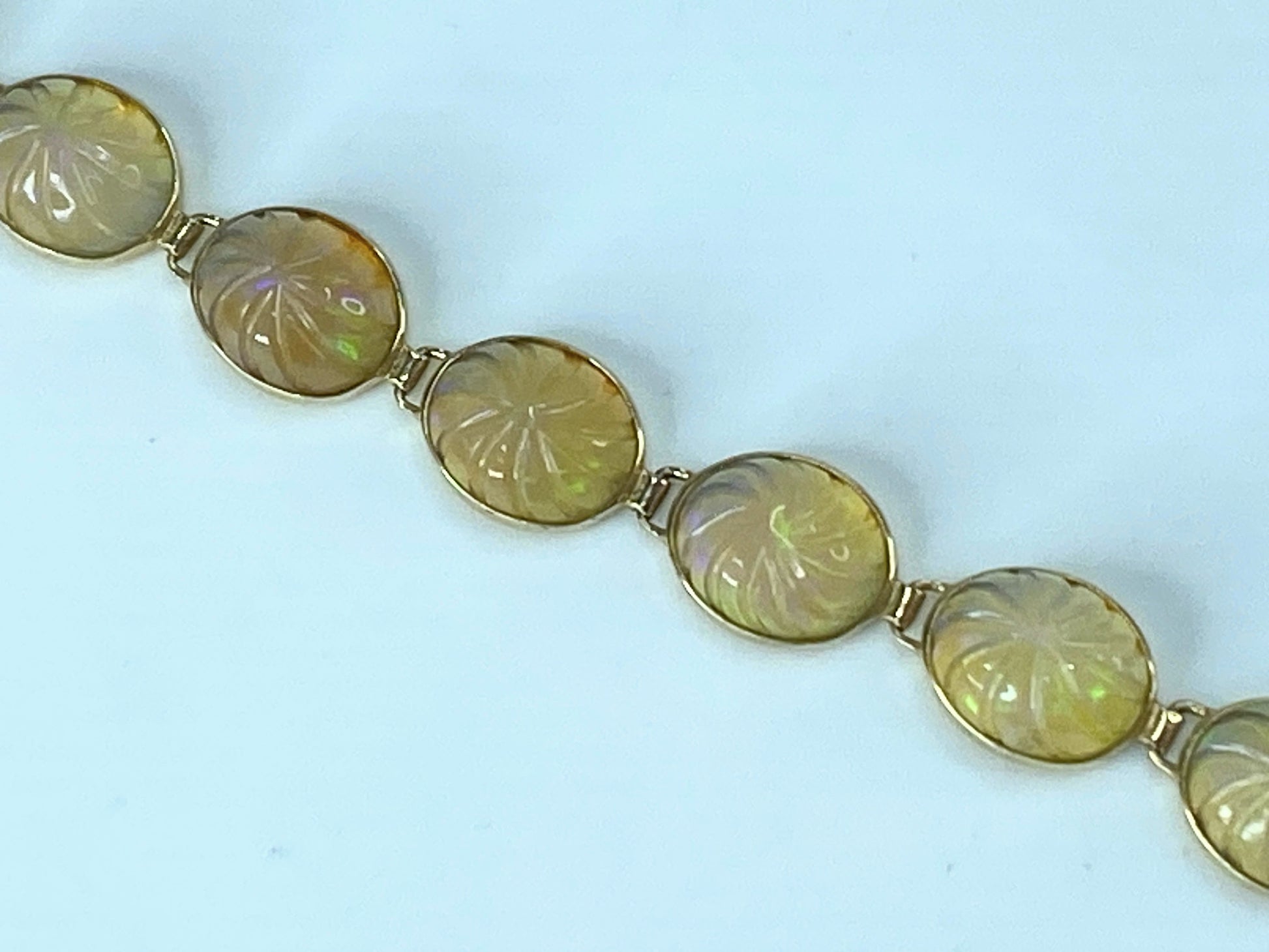 Mid-Century 14K yellow gold 28.2ct Carved oval Opal link bracelet 8.25" JR517