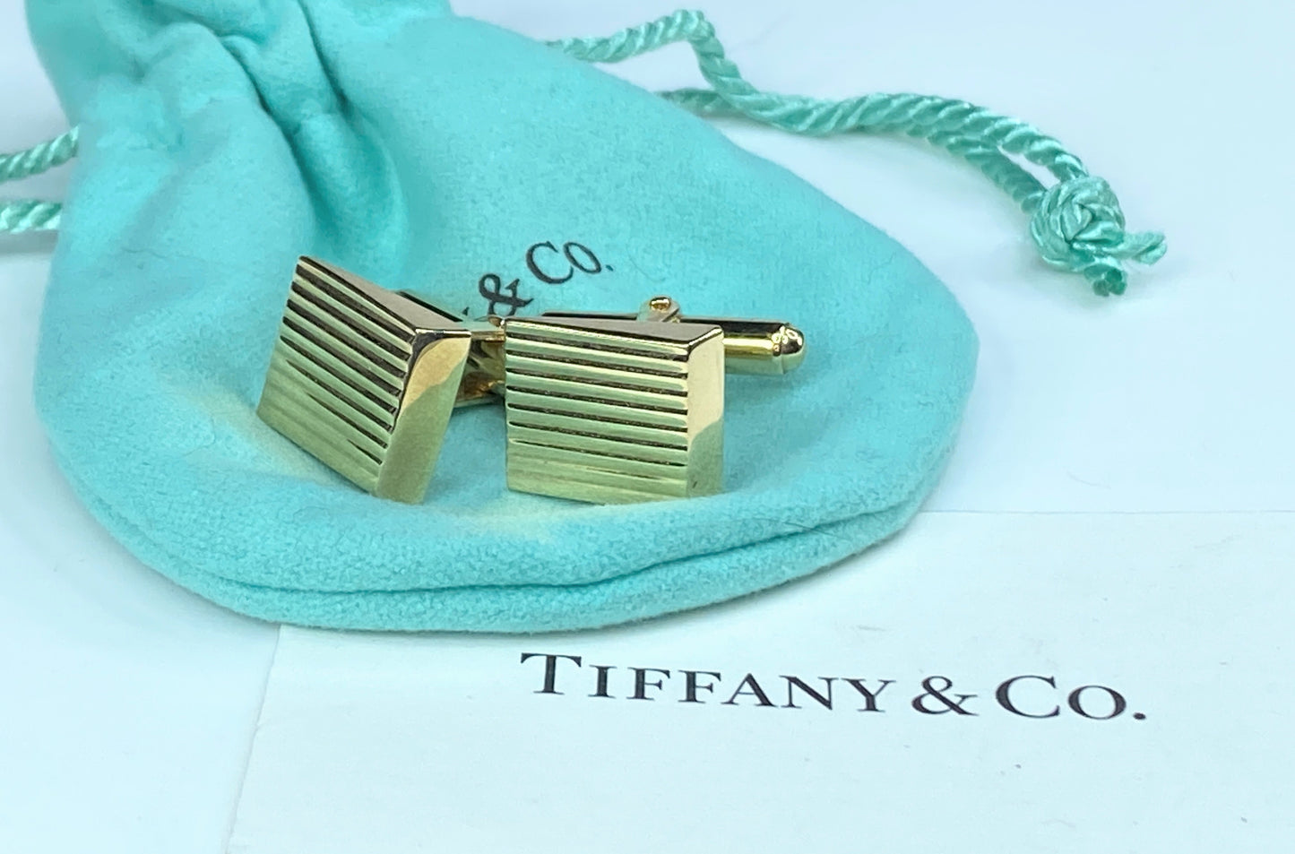 Tiffany & Co. 14K gold ribbed Cufflink w/pouch