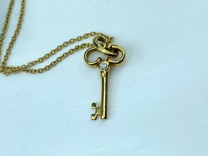 Tiffany & Co. 18K yellow gold Diamond Key pendant necklace 3.3g 24.25" JR930