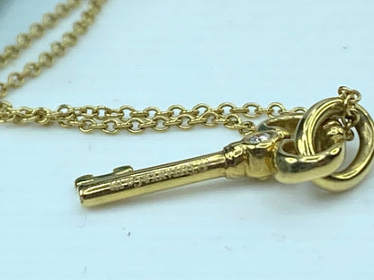 Tiffany & Co. 18K yellow gold Diamond Key pendant necklace 3.3g 24.25" JR930