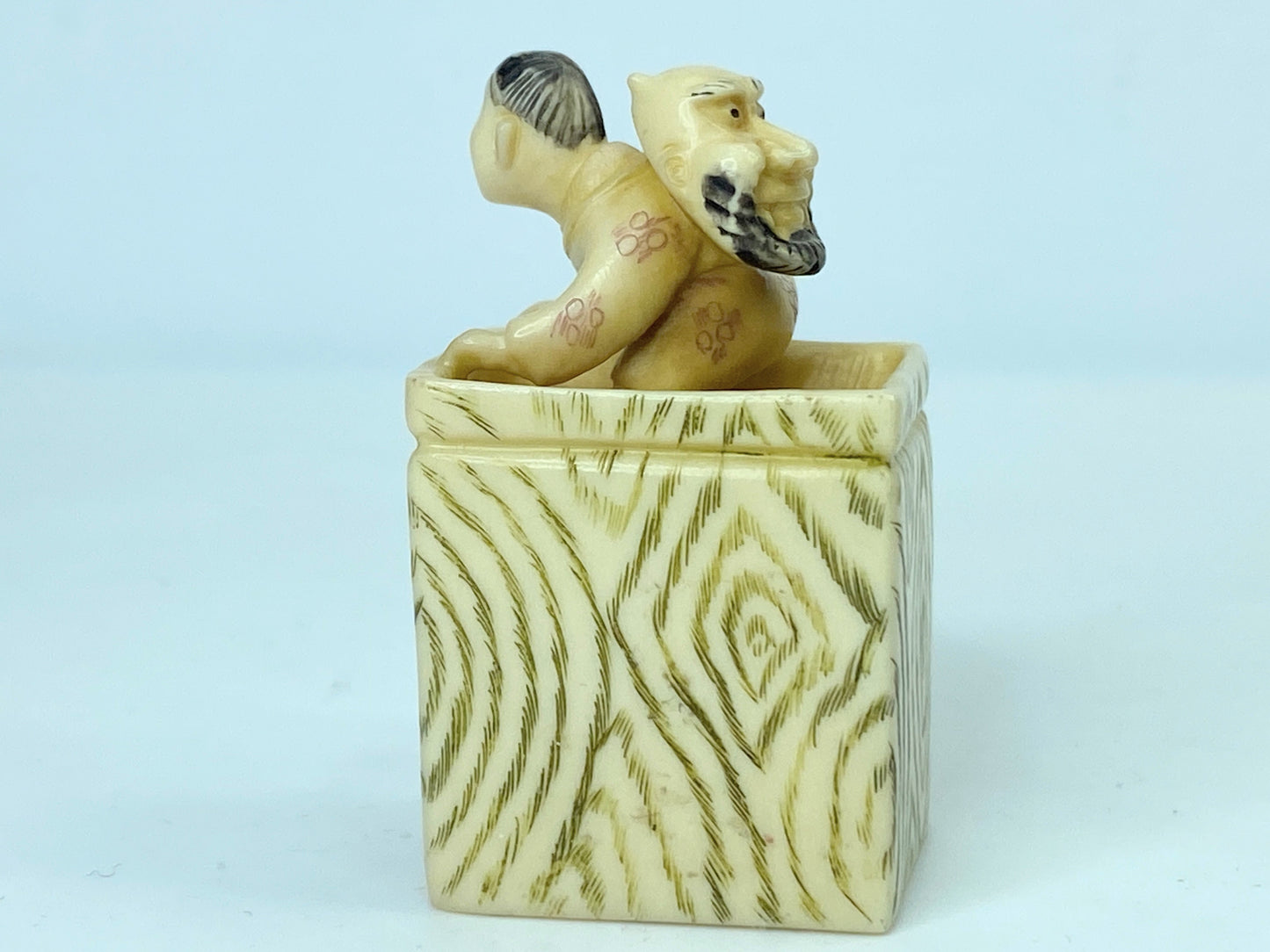 Signed antique carved resin/bone street performer netsuke 1 3/4" x 1 1/4" 26.8g GS650