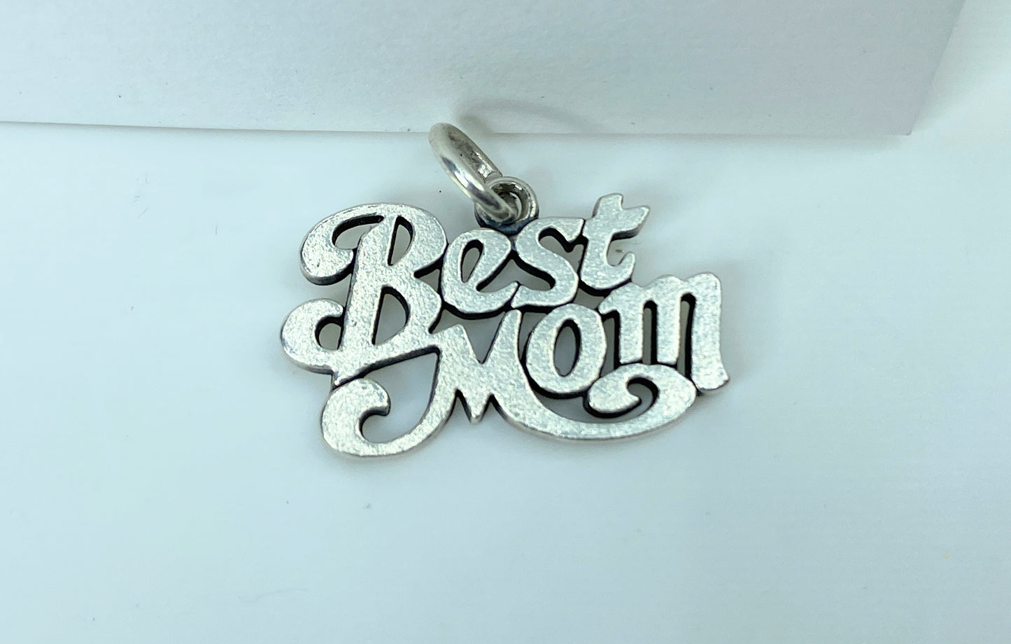 Show her who's best with a sterling silver charm that expresses your truest feelings, carefully crafted to remind her that she'll always be number one. Sterling silver approx. 22.0 x 13.8mm, weight 2.3 grams