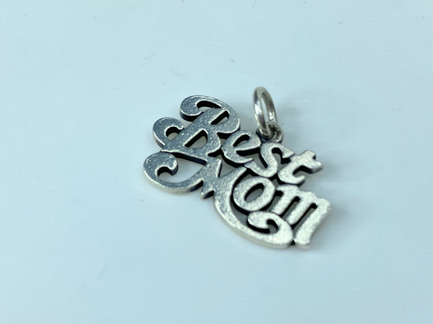 Show her who's best with a sterling silver charm that expresses your truest feelings, carefully crafted to remind her that she'll always be number one. Sterling silver approx. 22.0 x 13.8mm, weight 2.3 grams