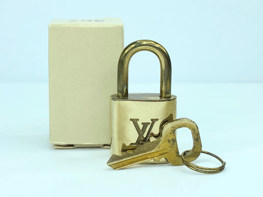 Vintage Louis Vuitton  Brass Lock and matching Key Set, lot number random GS633