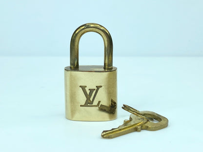 Vintage Louis Vuitton  Brass Lock and matching Key Set, lot number random GS633
