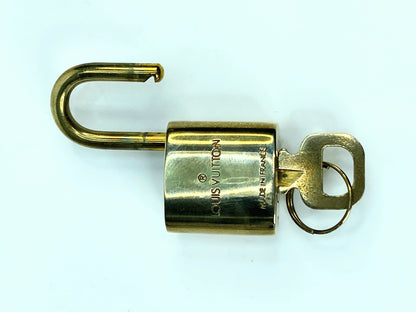 Vintage Louis Vuitton  Brass Lock and matching Key Set, lot number random GS633