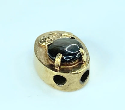 14K yellow gold 6.0mm Cat's Eye gems oval sliding charm 1.6g 13.8x9.2mm JR411